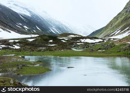 Summer mountain landscape with alpine lake(Silvretta Alps, Austria).