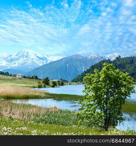 Summer mountain landscape with lake Lago di Resia (Italy)