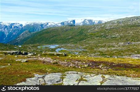 Summer mountain landscape with small lakes on slope (Norway).