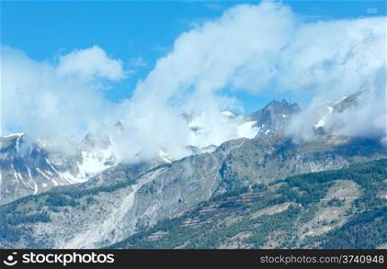 Summer mountain landscape with snow on mount top (Alps, Switzerland)