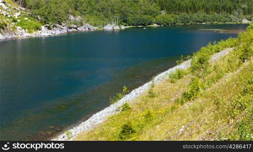 Summer mountain Suldalsvanet lake landscape (Norway).