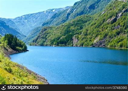 Summer mountain Suldalsvatn lake landscape (Norway).