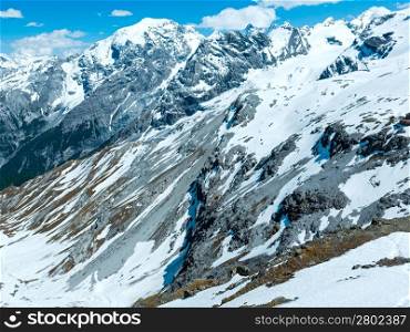 Summer mountain view from Stelvio pass with snow on slope (Italy)