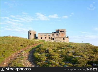 Summer mountain view with fortress - observatory ruins on Pip Ivan mountain top (Chornogora Ridge, Carpathian, Ukraine)