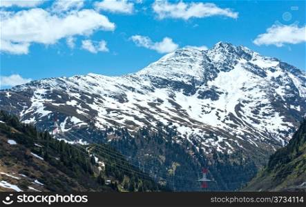 Summer mountain view with snow on mount top (Warth, Vorarlberg, Austria).