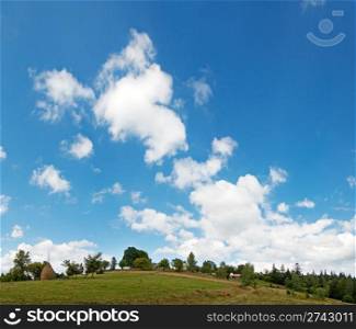 Summer mountain village hill top and high blue sky with fleecy clouds (Slavske village outskirts, Carpathian Mts, Ukraine). Five shots composite picture.