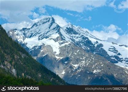 Summer mountain with snow on rock top (Switzerland)