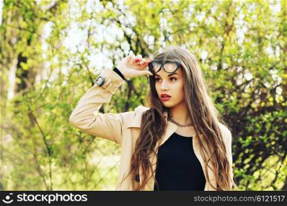 summer outdoor fashion portrait of young beautiful girl
