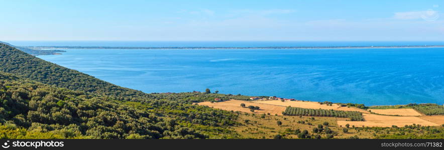 Summer panoramic view of Lago di Varano (Varano lake) on the Gargano peninsula in Puglia, Italy. Three shots stitch panorama.