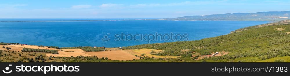 Summer panoramic view of Lago di Varano (Varano lake) on the Gargano peninsula in Puglia, Italy. Four shots stitch high-resolution panorama.