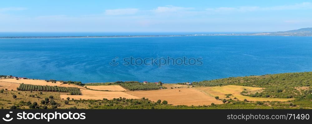 Summer panoramic view of Lago di Varano (Varano lake) on the Gargano peninsula in Puglia, Italy. Two shots stitch panorama.