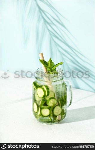 Summer party mocktail, cucumber mint iced cocktail. Modern Isometric Style. Creative Concept. Sunny day shadows