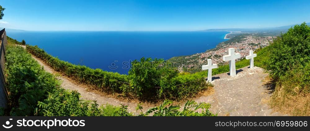 Summer picturesque Tyrrhenian sea Calabrian coast view from Monte Sant Elia (Saint Elia mount, Calabria, Italy). Three Christianity crosses on mountain top. Three shots stitch high-resolution panorama. Three crosses on Saint Elia mount top.