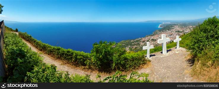 Summer picturesque Tyrrhenian sea Calabrian coast view from Monte Sant Elia (Saint Elia mount, Calabria, Italy). Three Christianity crosses on mountain top. Three shots stitch high-resolution panorama. Three crosses on Saint Elia mount top.