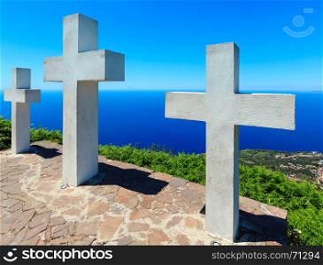 Summer picturesque Tyrrhenian sea Calabrian coast view from Monte Sant'Elia (Saint Elia mount, Calabria, Italy) top. Three Christianity crosses on mountain top.