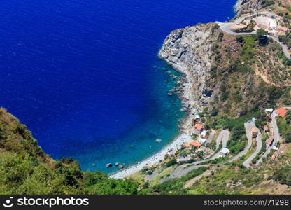 Summer picturesque Tyrrhenian sea Calabrian rocky coast view from Monte Sant'Elia (Saint Elia mount, Calabria, Italy) top. People unrecognizable.