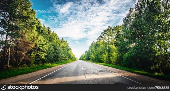 Summer road. Highway move forward direction background. Summer road outdoor landscape