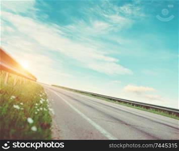 Summer road, sky, sun and clouds background. Summer road, sky, sun and clouds