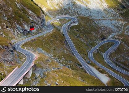 Summer Road Trip. beautiful landscape and view of a mountain road and cable road Transfagarasan. Romania.