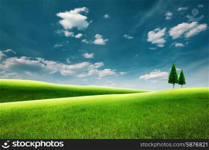 Summer rural landscape with green hills under blue skies