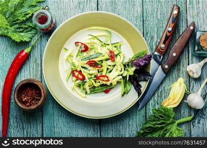 Summer salad of fresh zucchini, peppers and garlic.Vegetable salad. Zucchini vegetable salad