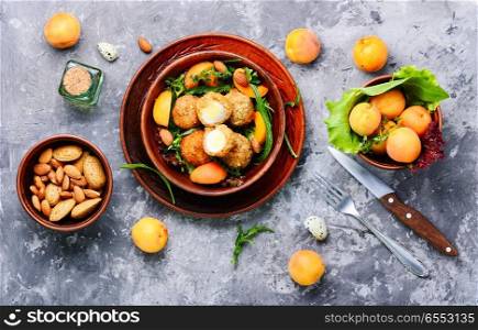 Summer salad with apricot, egg and greens.Healthy food. Summer salad with apricot