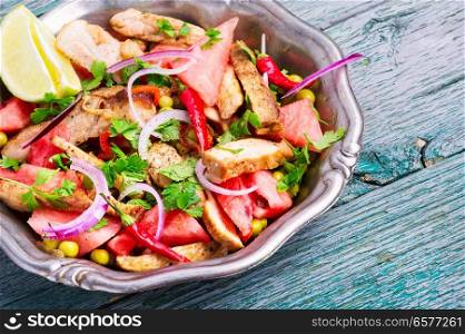 Summer salad with beef steak, watermelon and spices.Exotic food,. Meat salad with watermelon