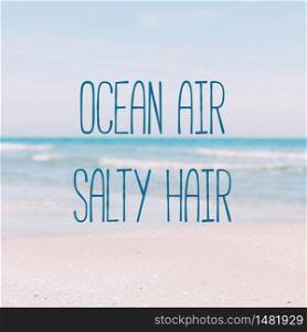 Summer sand beach and seashore waves background. Defocused blurred square holiday vacations concept with motivational quote Ocean air salty hair