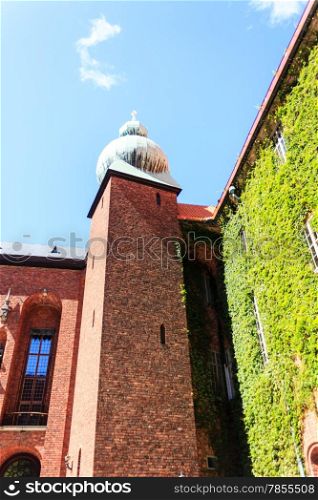 Summer scenery of City Hall Tower in the Old Town (Gamla Stan) in Stockholm, Sweden