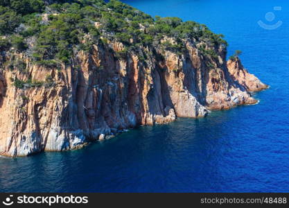 Summer sea rocky coast view. Coastline between Barcelona and Palamos (Coasta Brava, Catalonia, Spain).