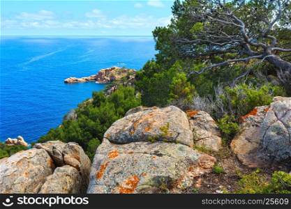 Summer sea rocky coast view. Coastline between Barcelona and Palamos (Costa Brava, Catalonia, Spain).