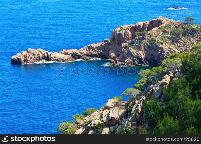 Summer sea rocky coast view. Coastline between Barcelona and Palamos (Costa Brava, Catalonia, Spain).