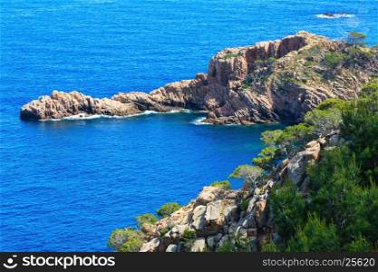Summer sea rocky coast view. Coastline between Barcelona and Palamos (Costa Brava, Catalonia, Spain).