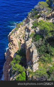 Summer sea rocky coast view. Coastline between Barcelona and Palamos (Costa Brava, Catalonia, Spain).