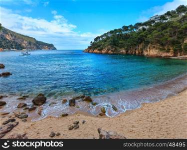 Summer sea rocky coast view from beach (near Palamos, Costa Brava, Catalonia, Spain).