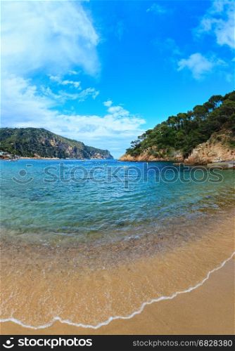 Summer sea rocky coast view from beach (near Palamos, Costa Brava, Catalonia, Spain). Two shots stitch image.