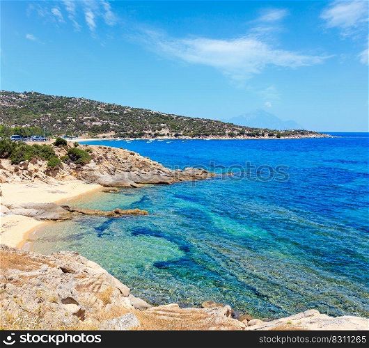 Summer sea scenery with aquamarine transparent water and sandy beaches. View from shore  Sithonia, Halkidiki, Greece .