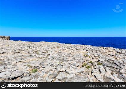 Summer sea view from rocky Capo Murro di Porco - Syracuse, Sicily, Italy, Mediterranean sea.