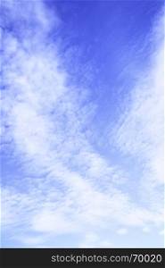 Summer sky and clouds, may be used as background (vertical composition)