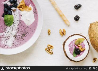 summer smoothie coconut bowl. High resolution photo. summer smoothie coconut bowl. High quality photo