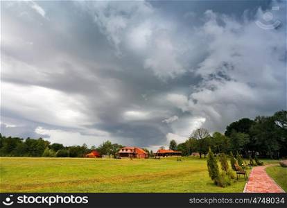 Summer storm landscape. Dramatic cloudy sky. Hurricane and rain in Belarus