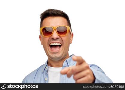 summer, style, emotions and people concept - face of smiling middle aged latin man in shirt and sunglasses