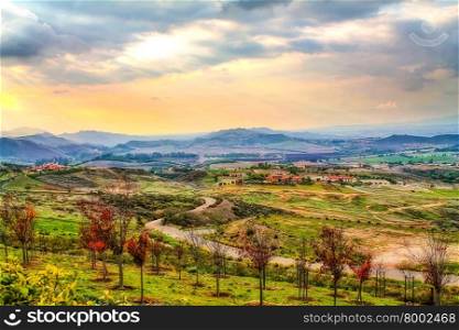 summer sunlight with cloudy sky and rural view