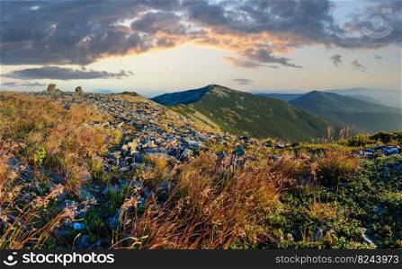 Summer sunrise Carpathian mountain top view from stony summit of Ihrovets Mount  Gorgany, Ukraine . 