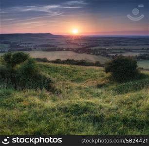 Summer sunset landscape over countryside