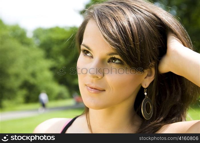 Summer Time. Young Woman Relaxing In The Park.