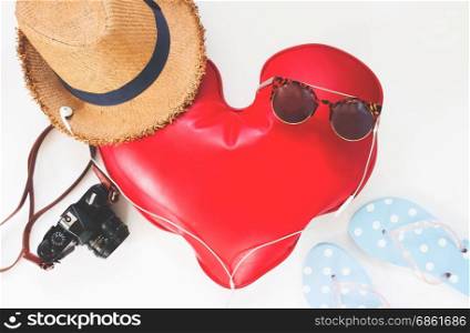 Summer travel concept with heart on white background, Flat lay love travel