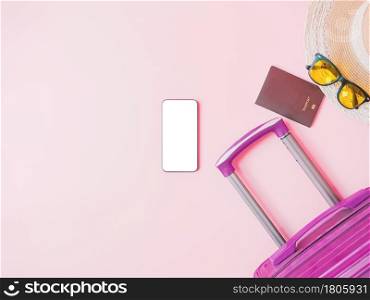 Summer traveler accessories on pink background, Smartphone with blank screen.