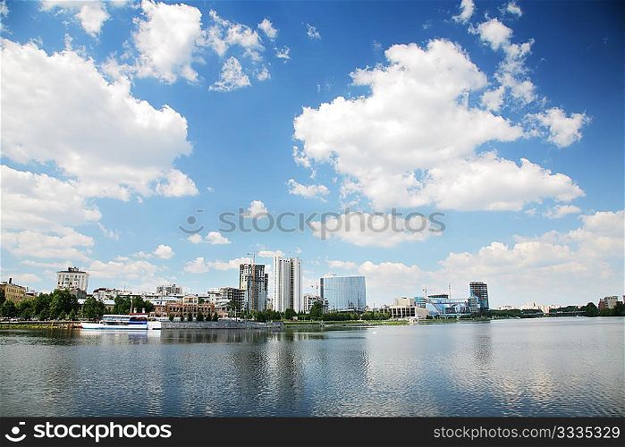 summer urban landscape with clouds