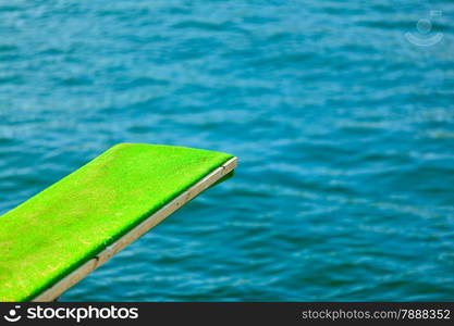 Summer vacation and dangerous sport. View of diving board. Springboard to dive at water.